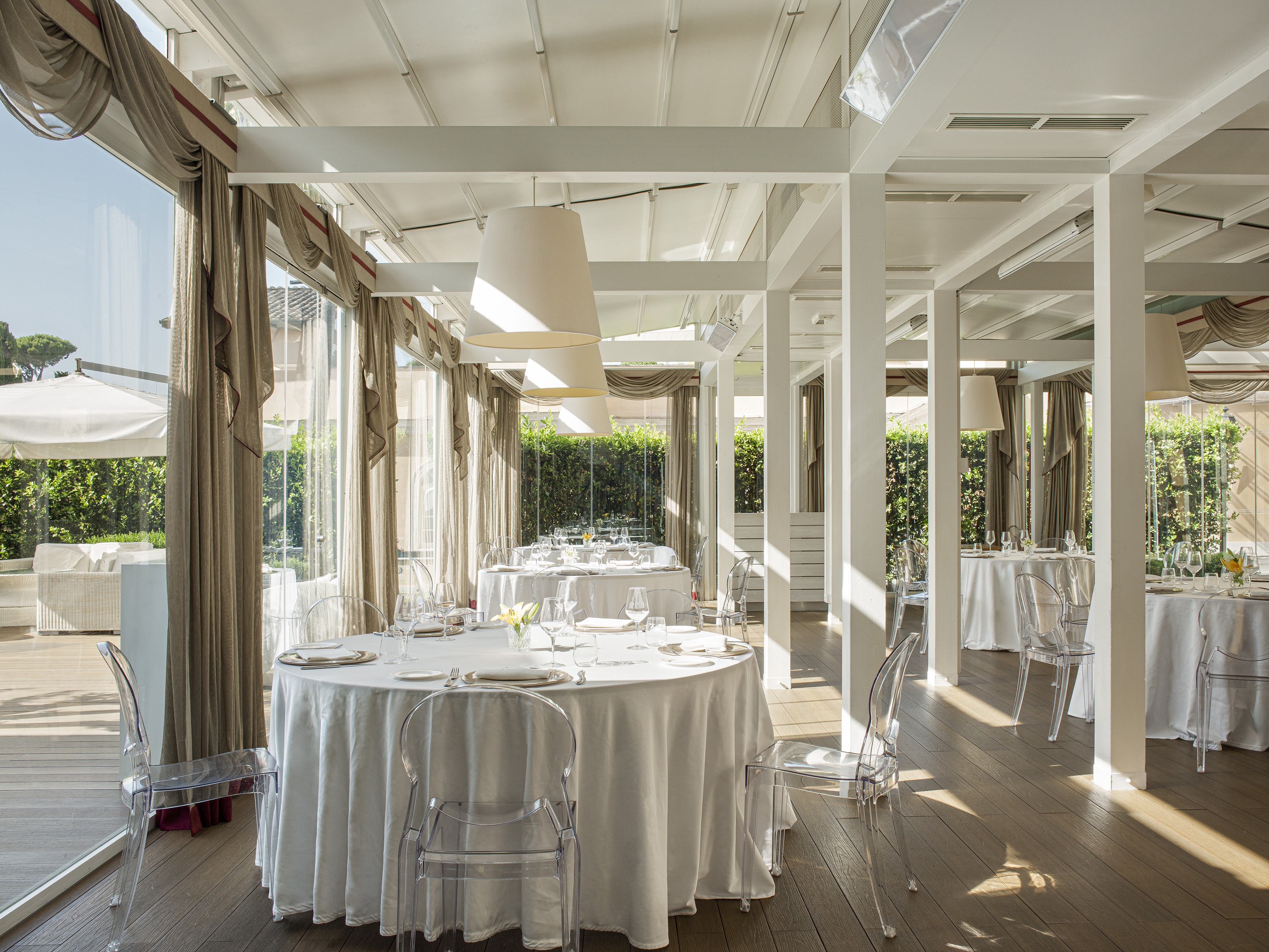 a room with tables and chairs