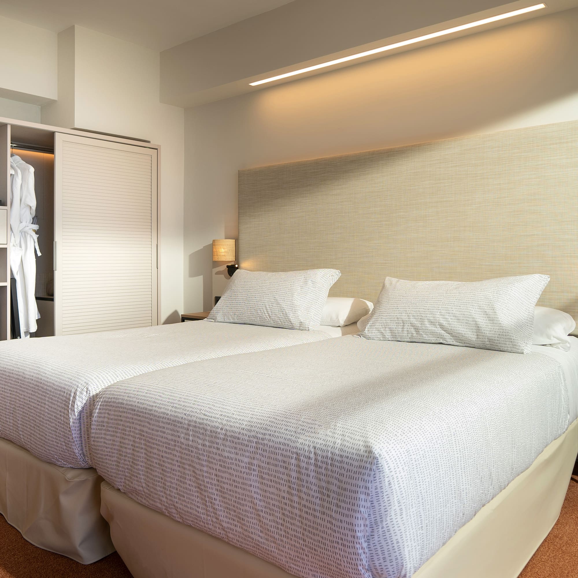 a room with two beds