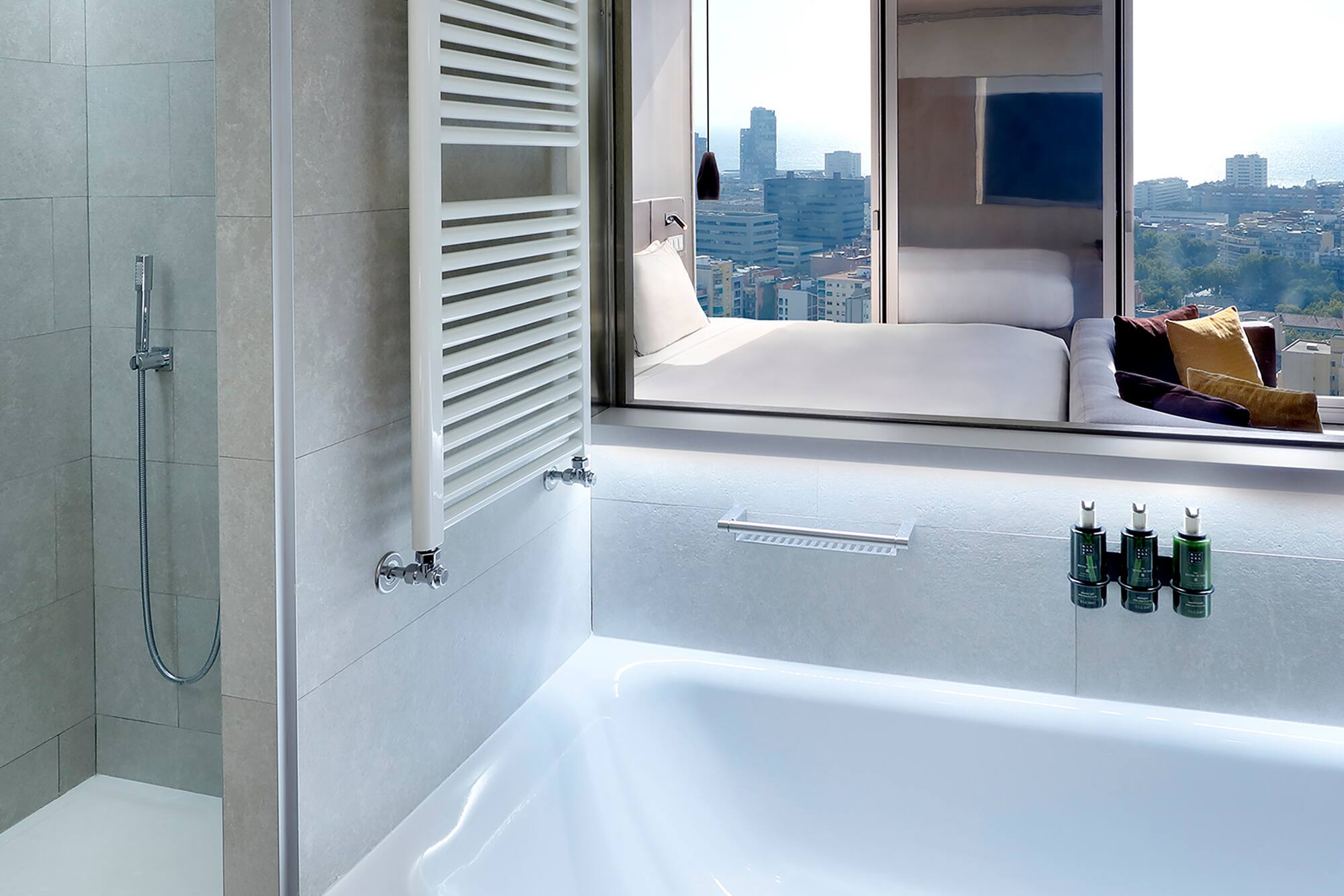 a bathroom with a bathtub and a mirror
