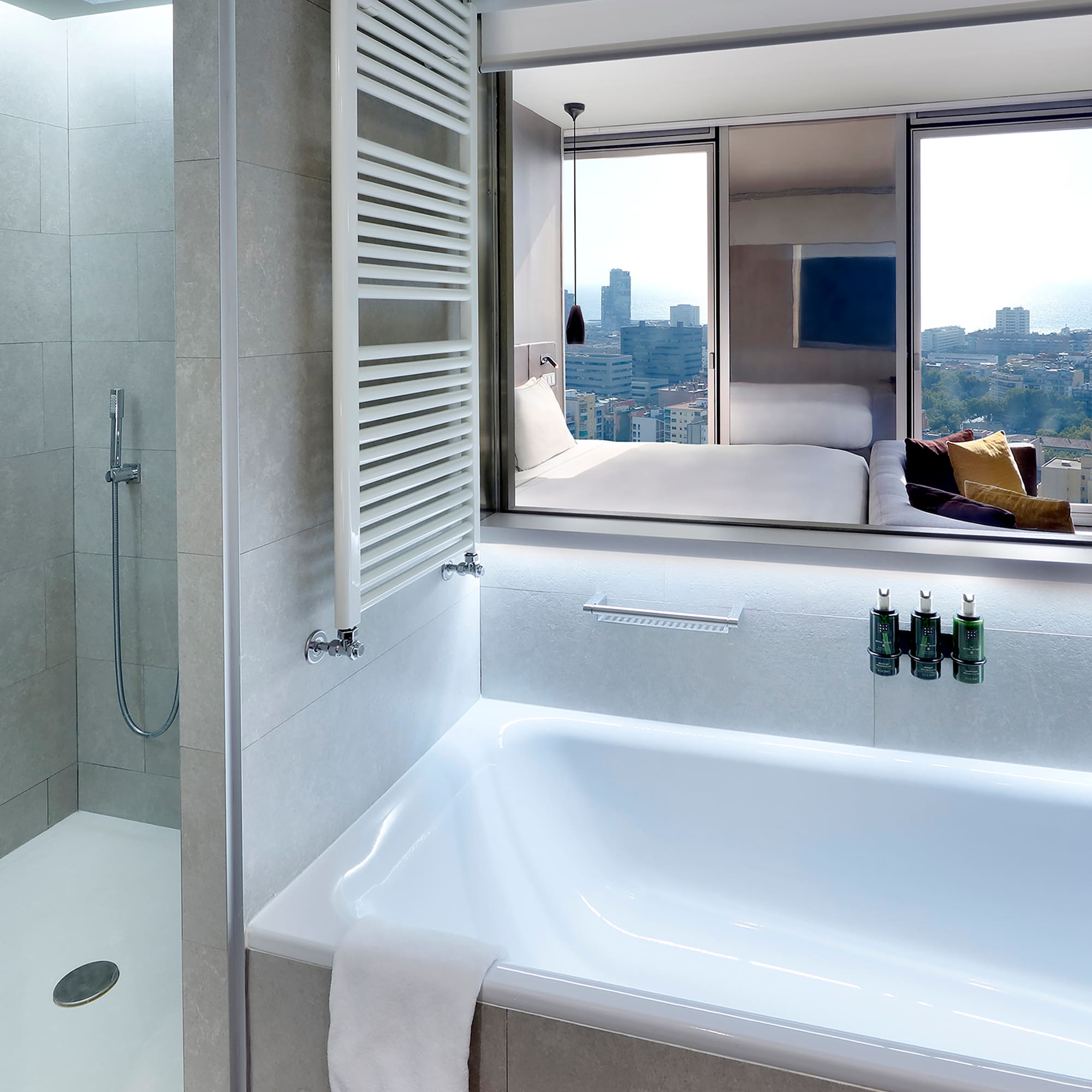 a bathroom with a bathtub and a mirror