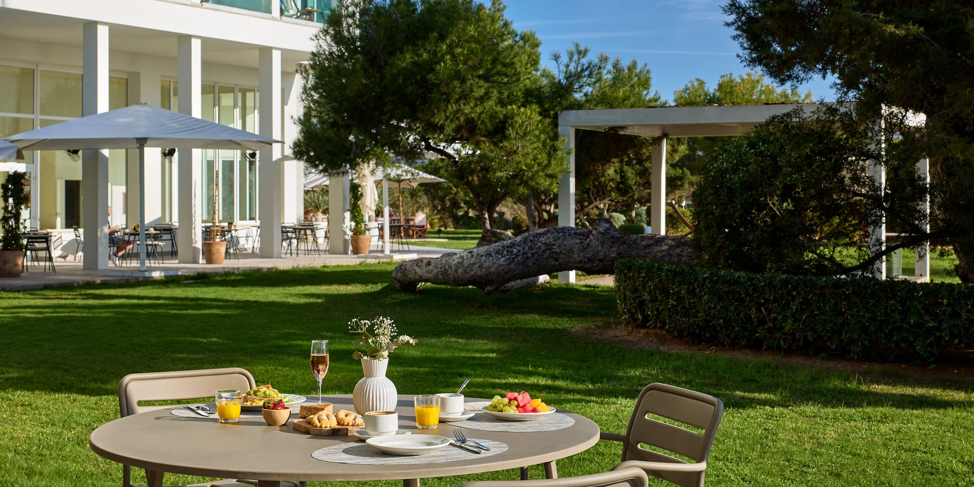 a table with food on it in front of a building