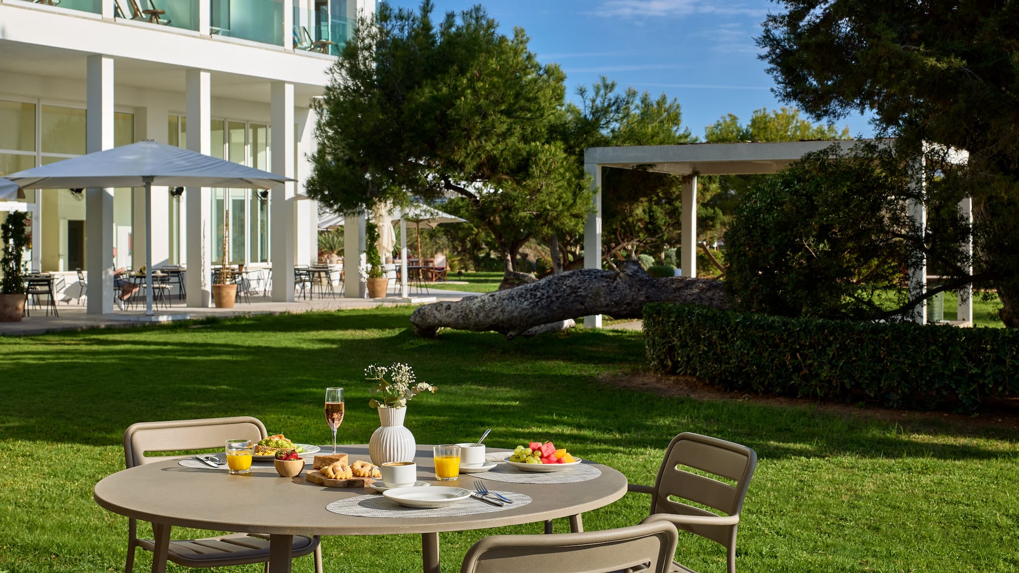 a table with food on it in front of a building