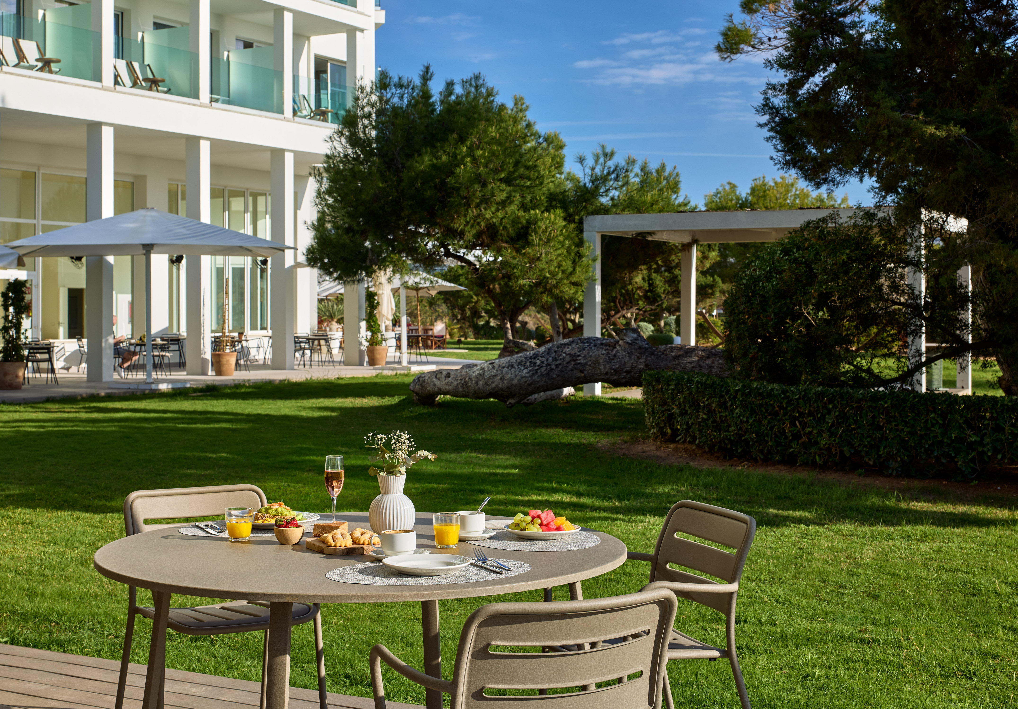 a table with food on it in front of a building
