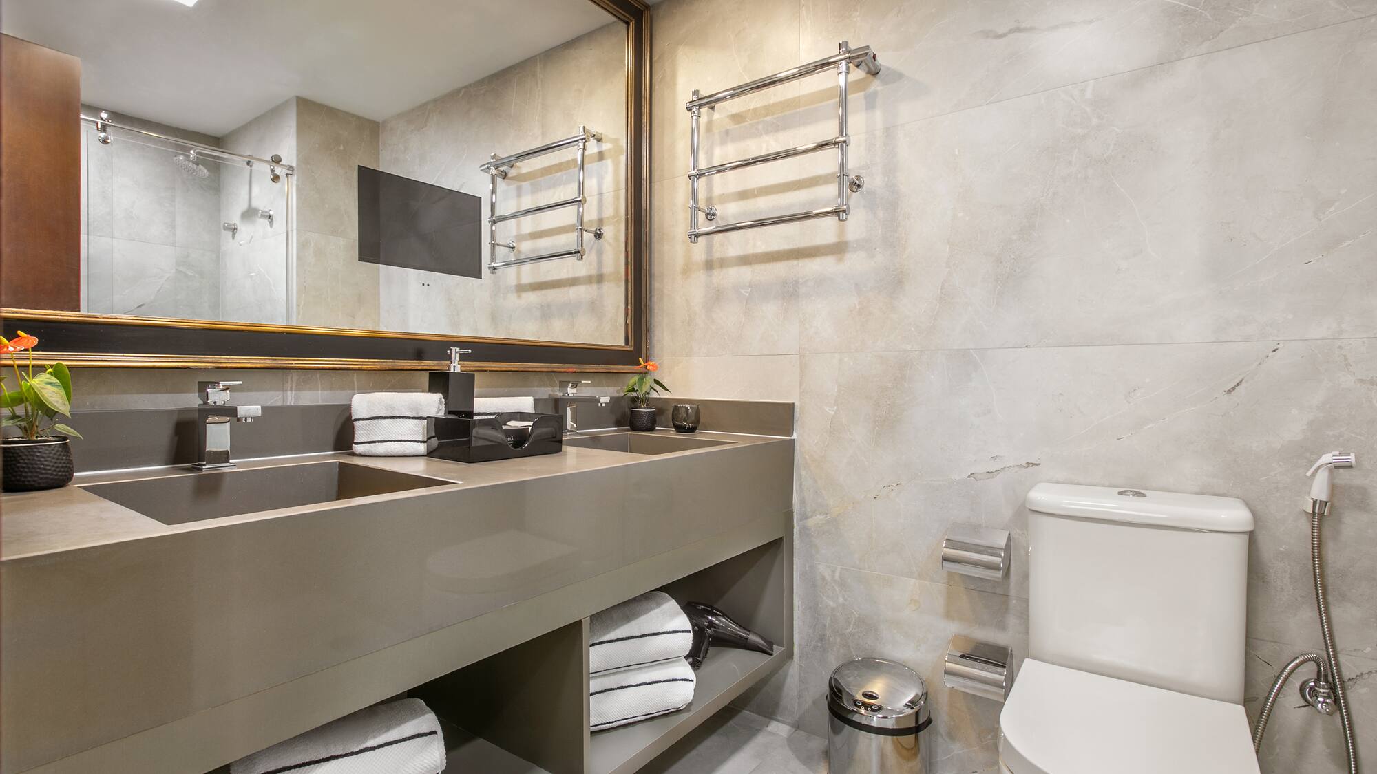 a bathroom with a sink and toilet