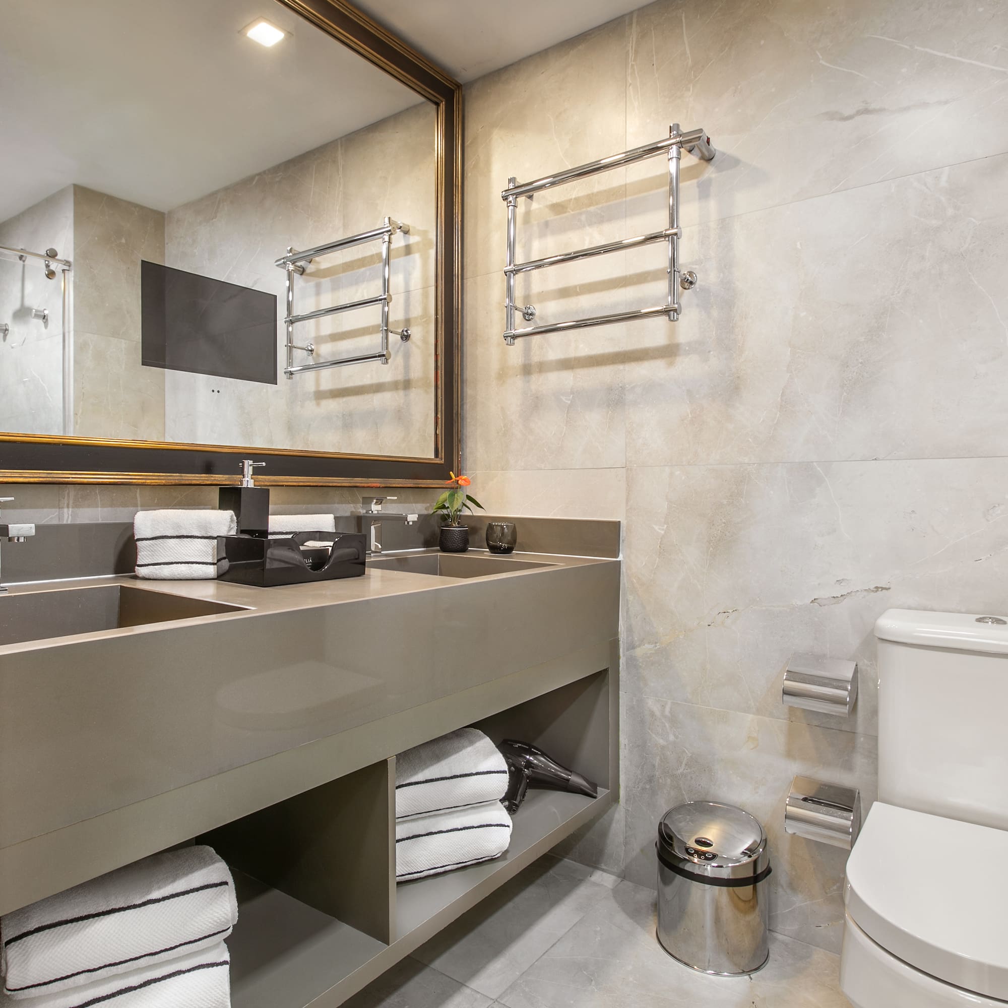 a bathroom with a sink and toilet