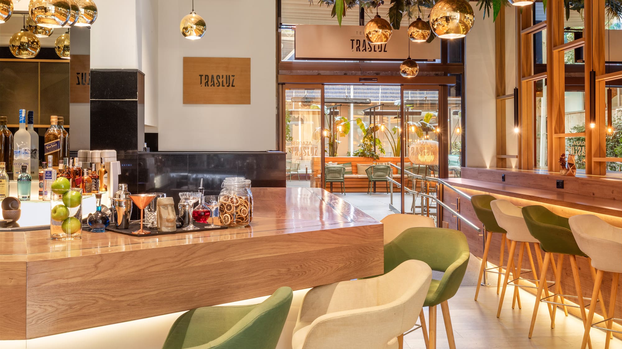 a bar with a counter and chairs