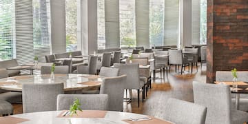 a room with tables and chairs