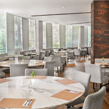 a room with tables and chairs