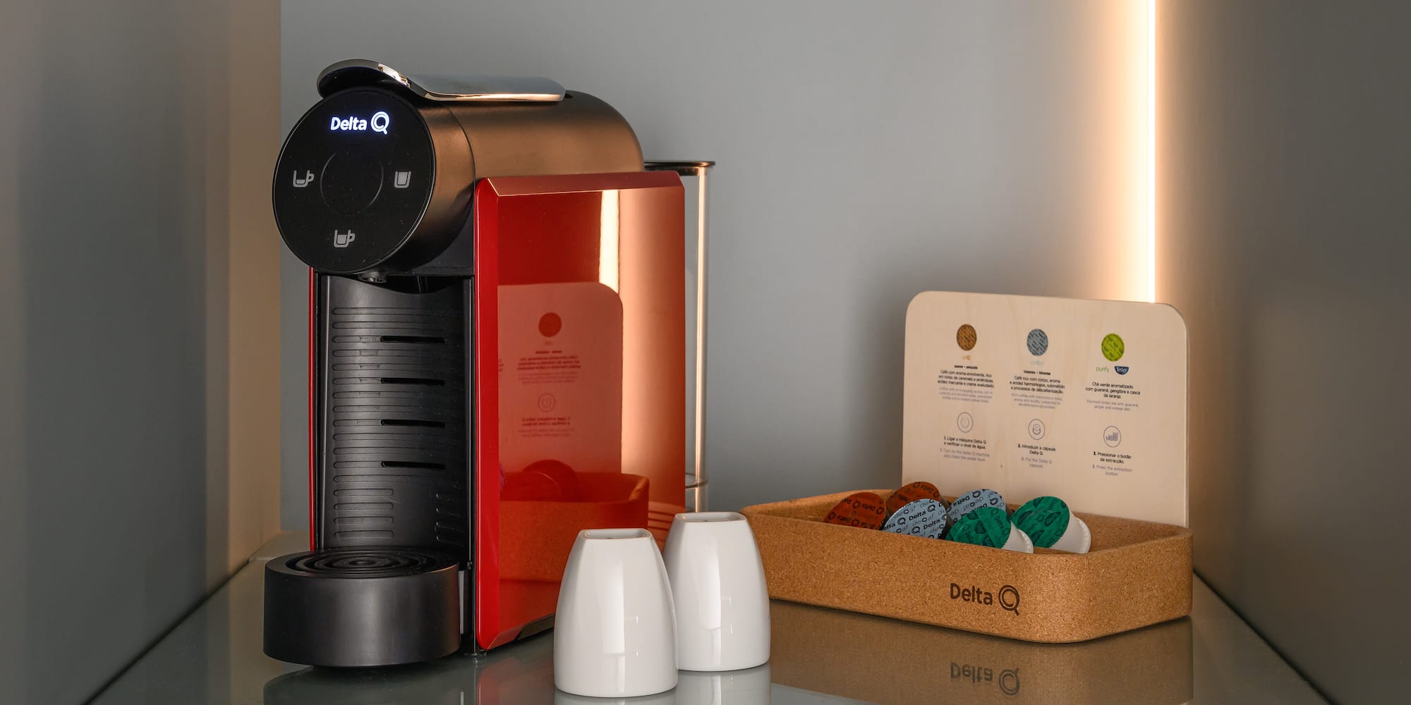 a coffee machine and a box of coffee beans