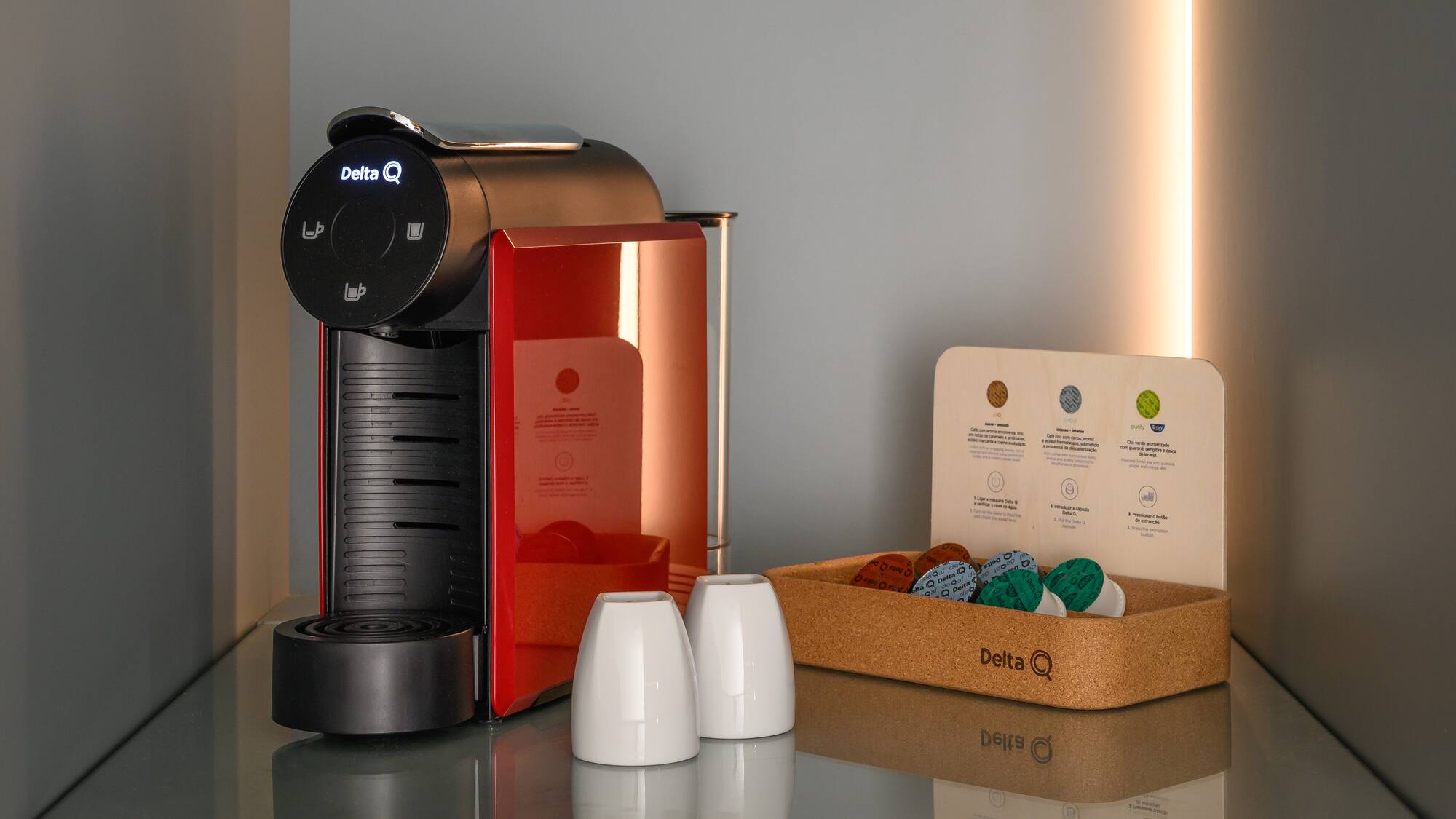 a coffee machine and a box of coffee beans