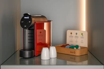 a coffee machine and a box of coffee beans