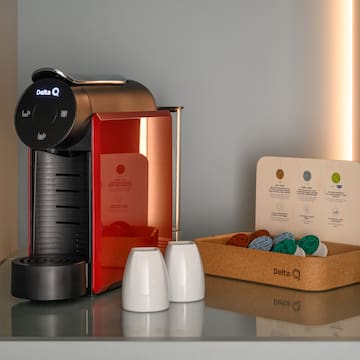 a coffee machine and a box of coffee beans