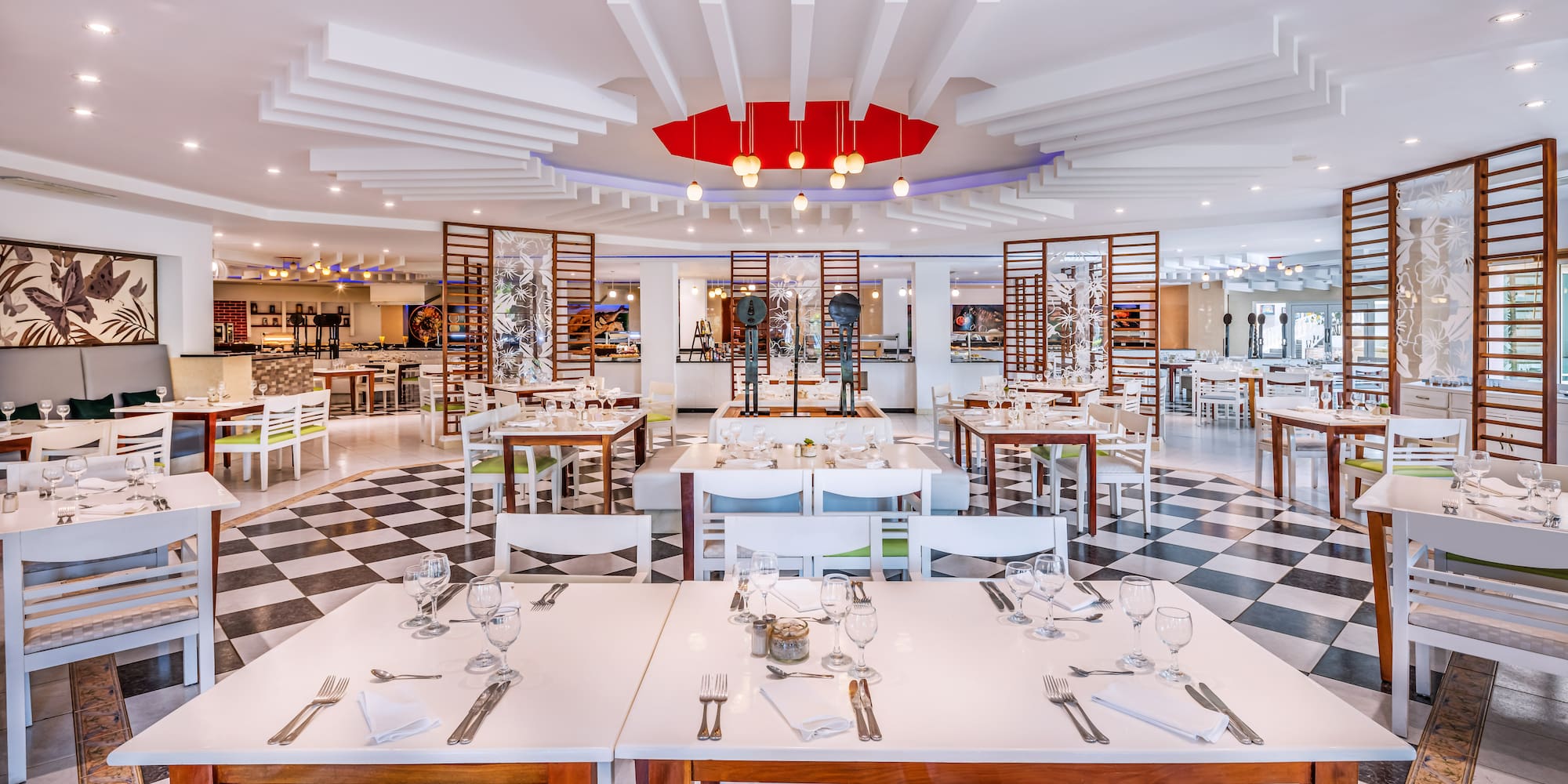 a restaurant with tables and chairs