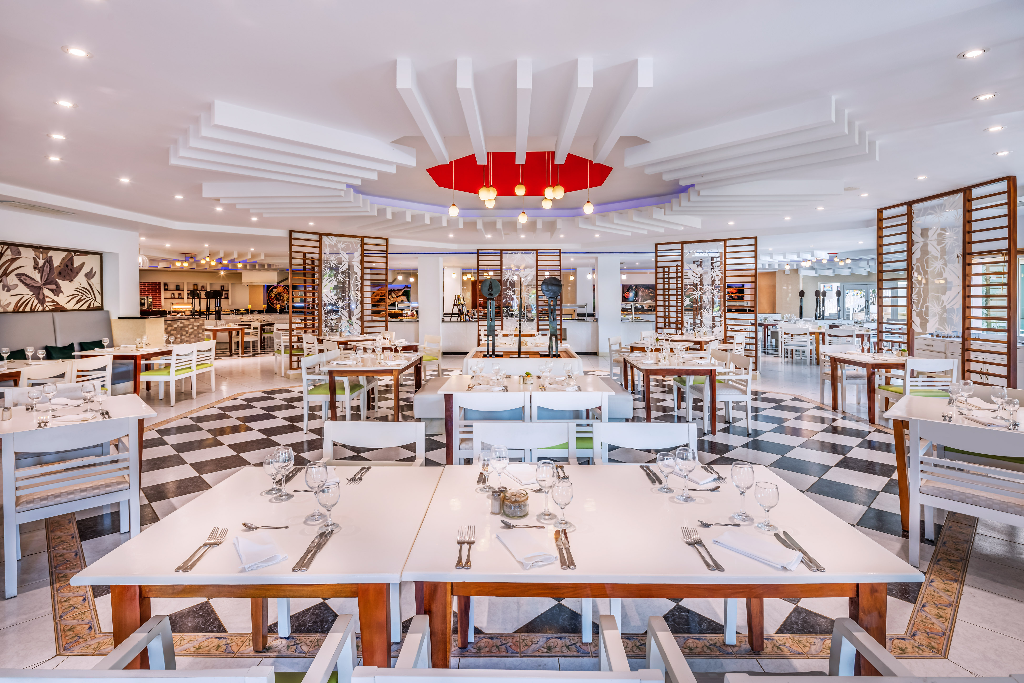 a restaurant with tables and chairs