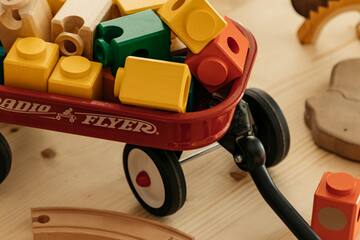 a toy wagon full of blocks