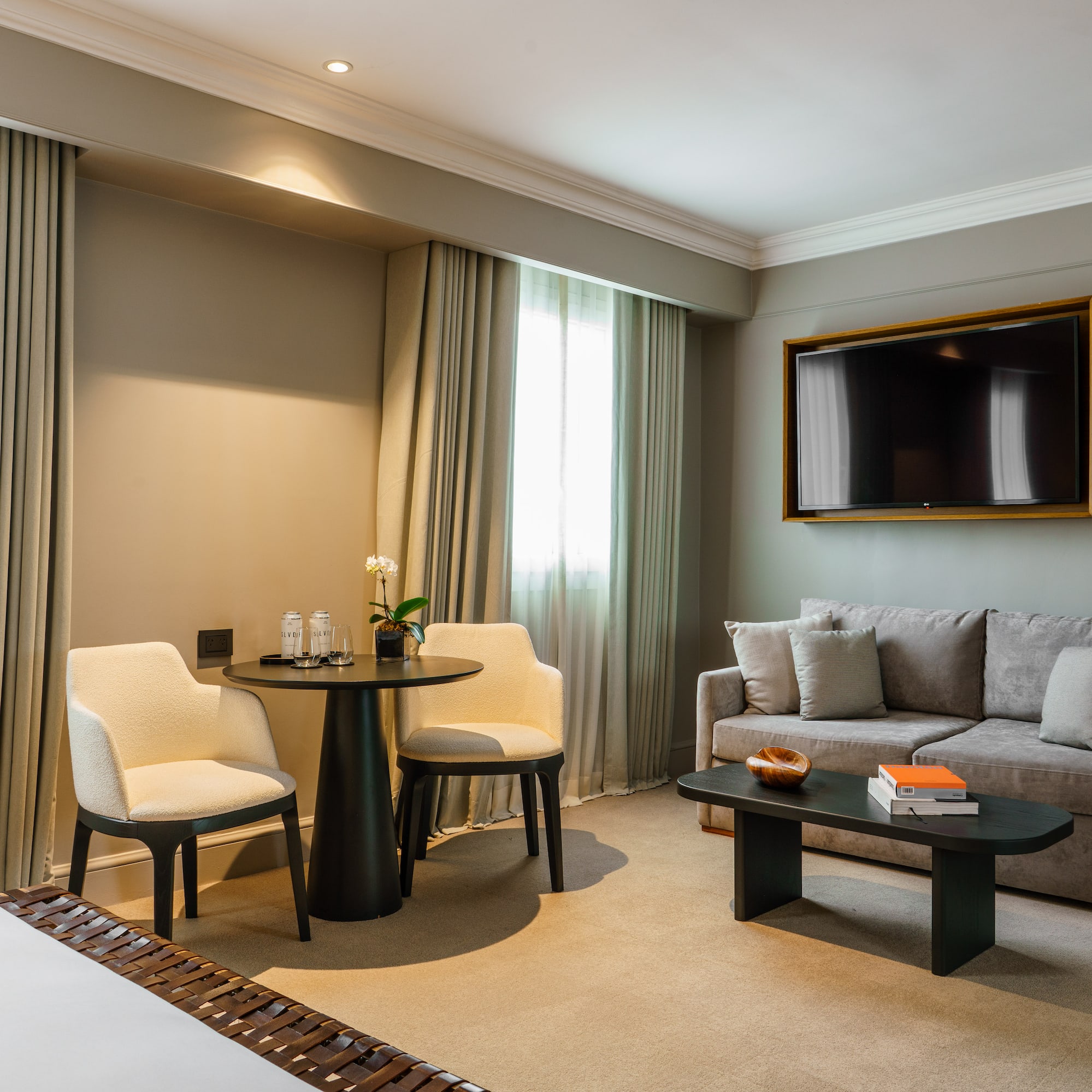 a room with a tv and a table