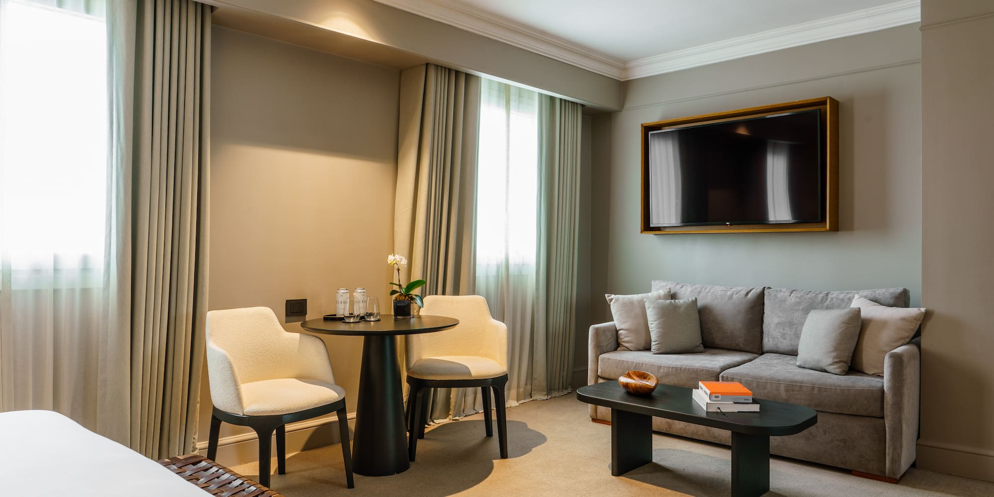 a room with a tv and a table