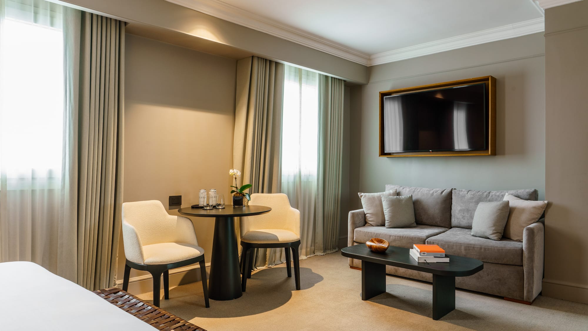 a room with a tv and a table