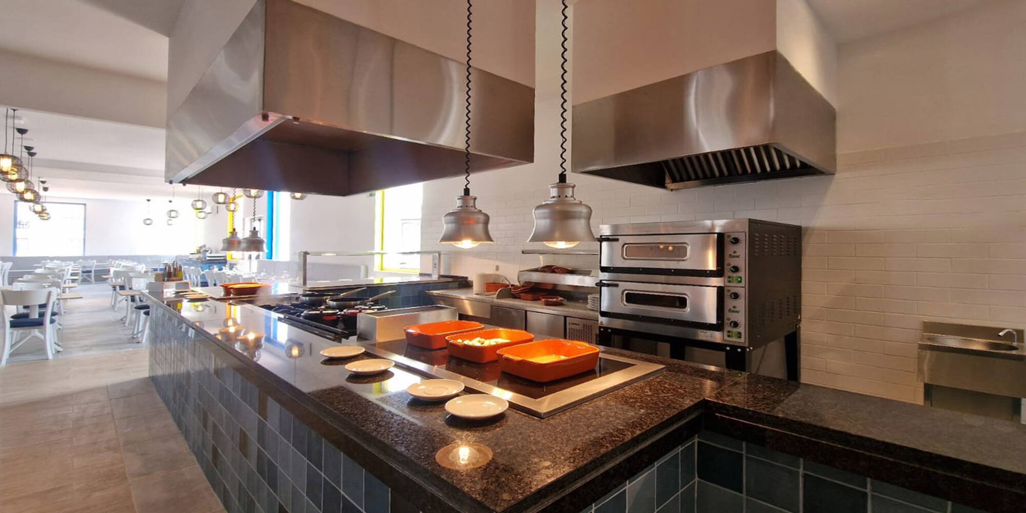 a kitchen with stainless steel appliances