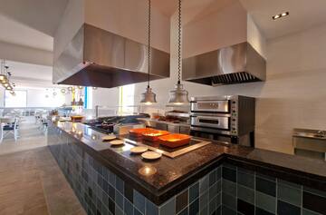a kitchen with stainless steel appliances
