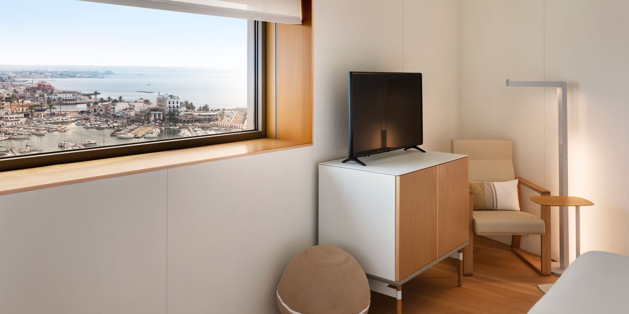 a room with a television and a chair