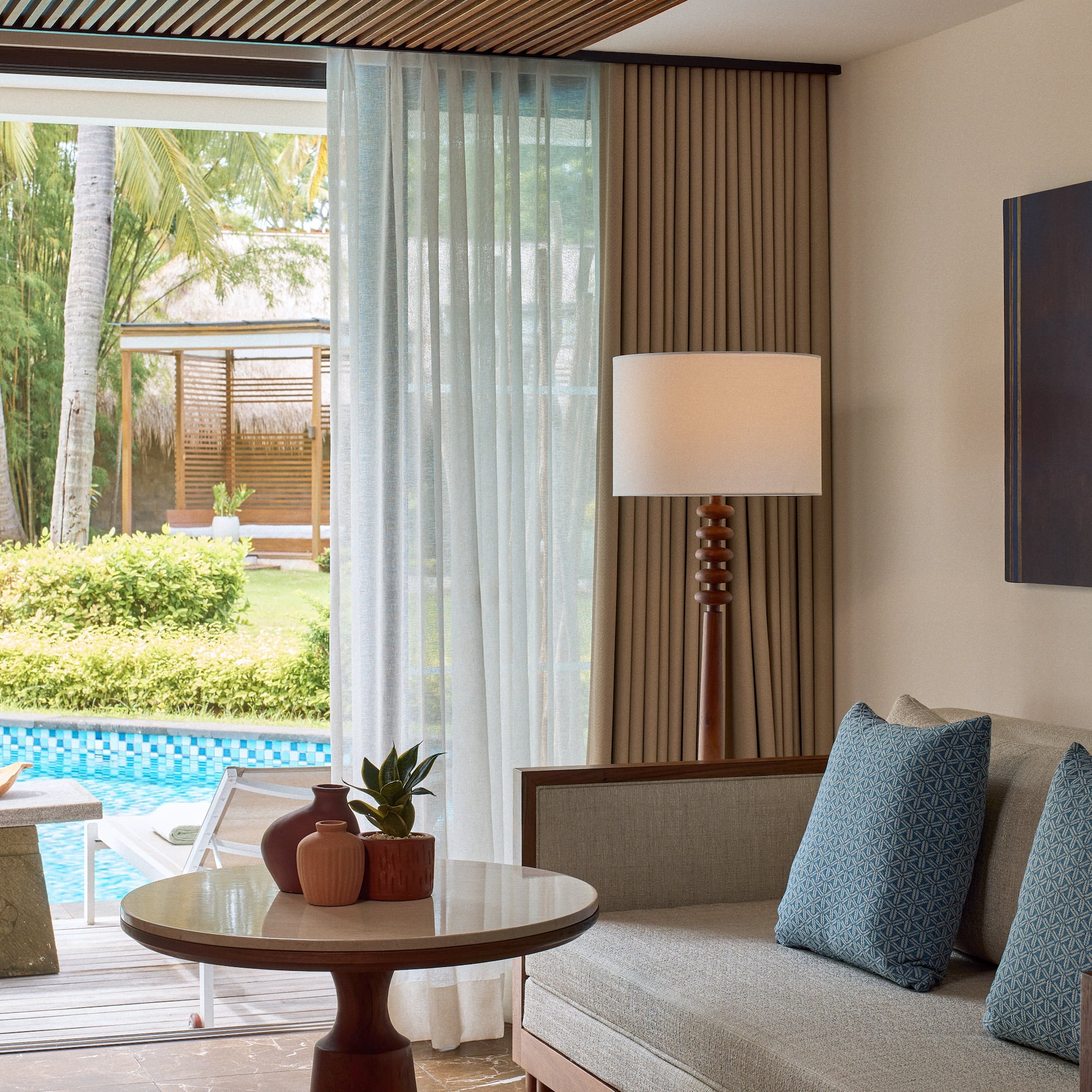 a living room with a couch and a table