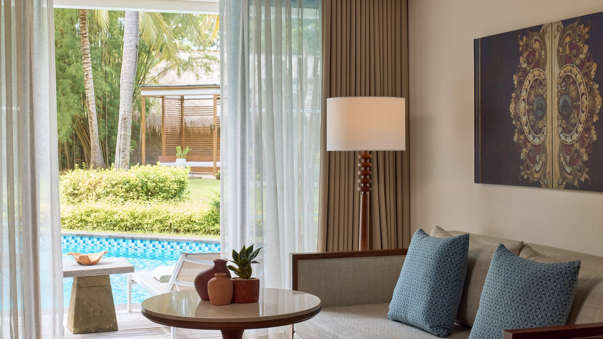 a living room with a couch and a table