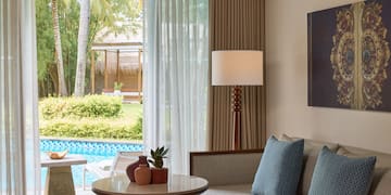 a living room with a couch and a table