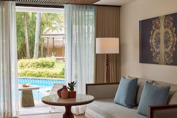 a living room with a couch and a table