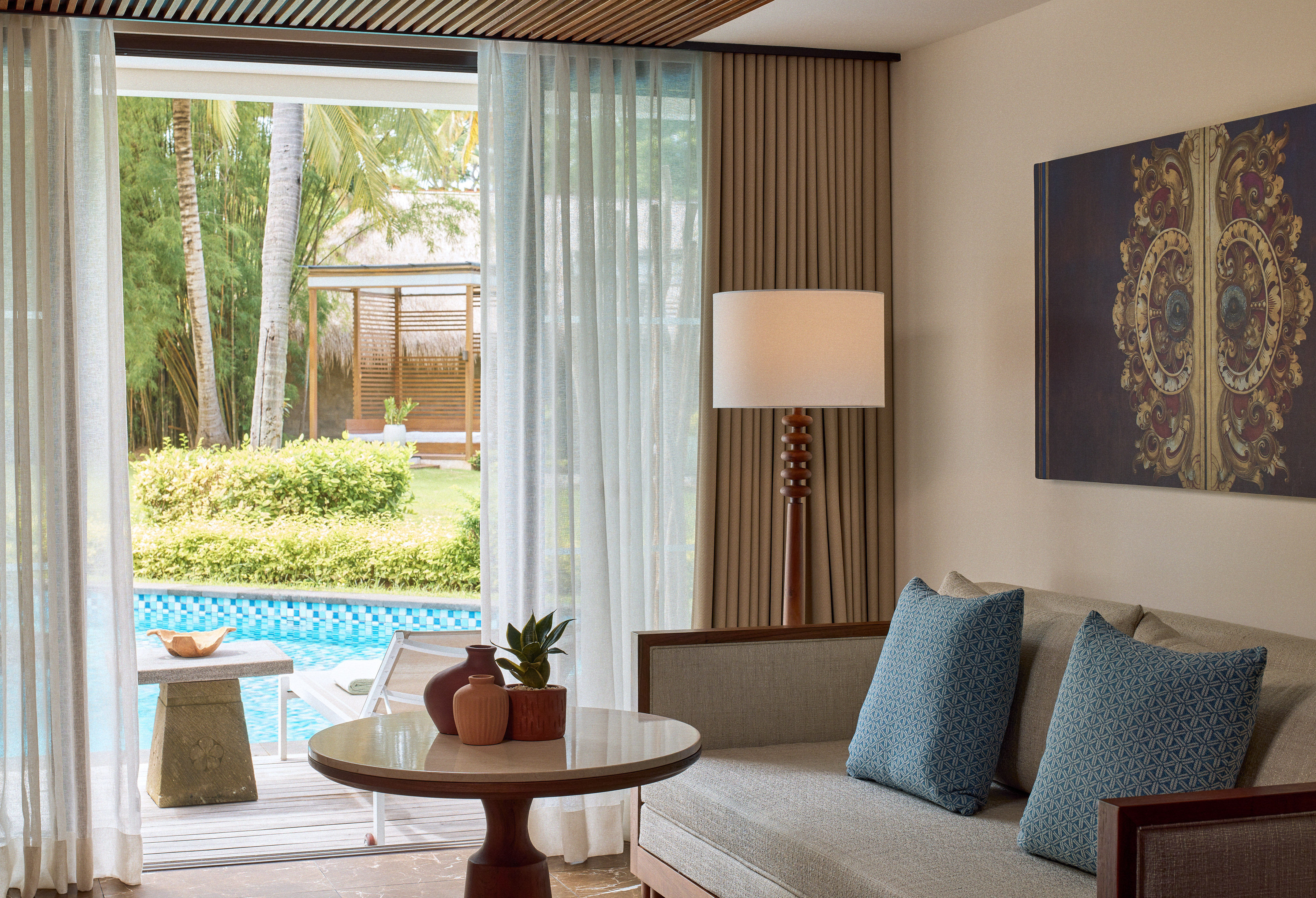 a living room with a couch and a table