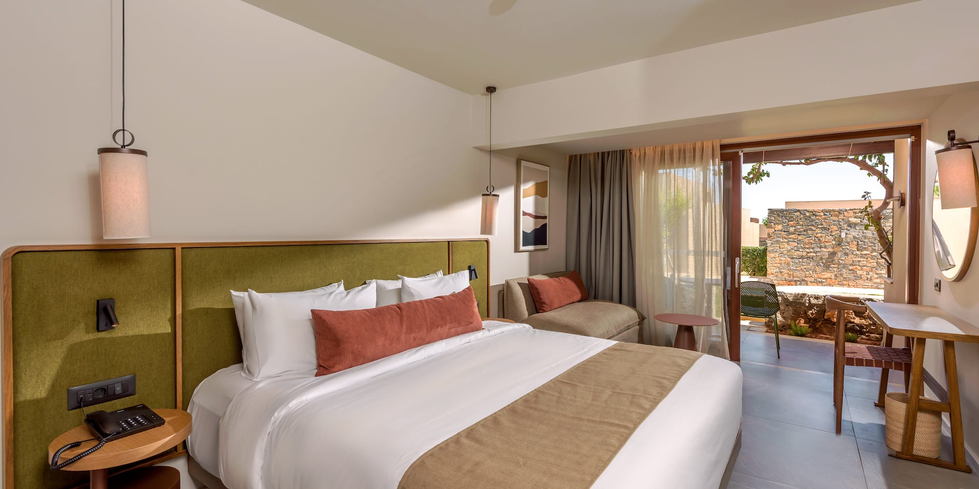 a bed and a couch in a room.