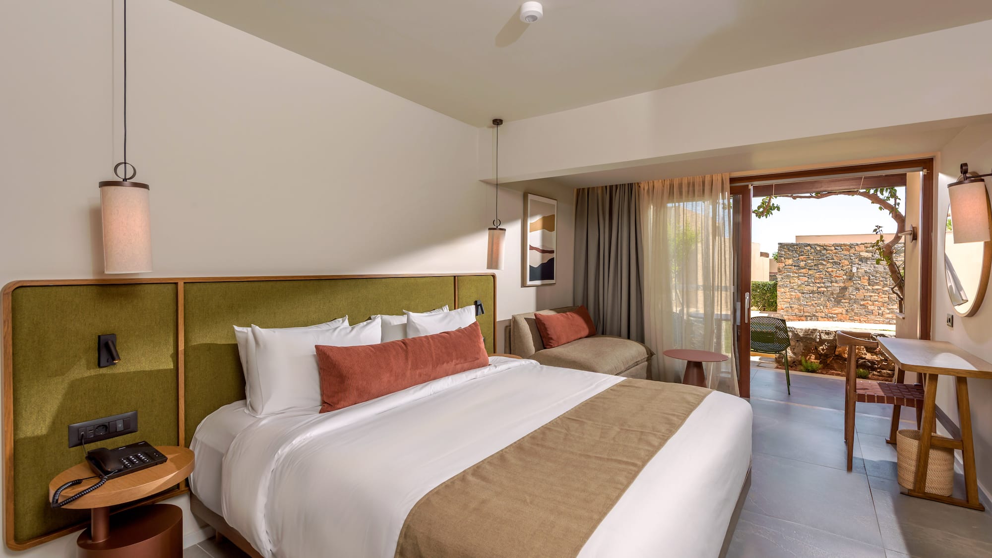 a bed and a couch in a room.