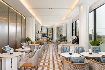 a room with tables and chairs