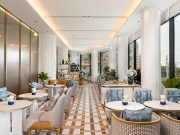 a room with tables and chairs