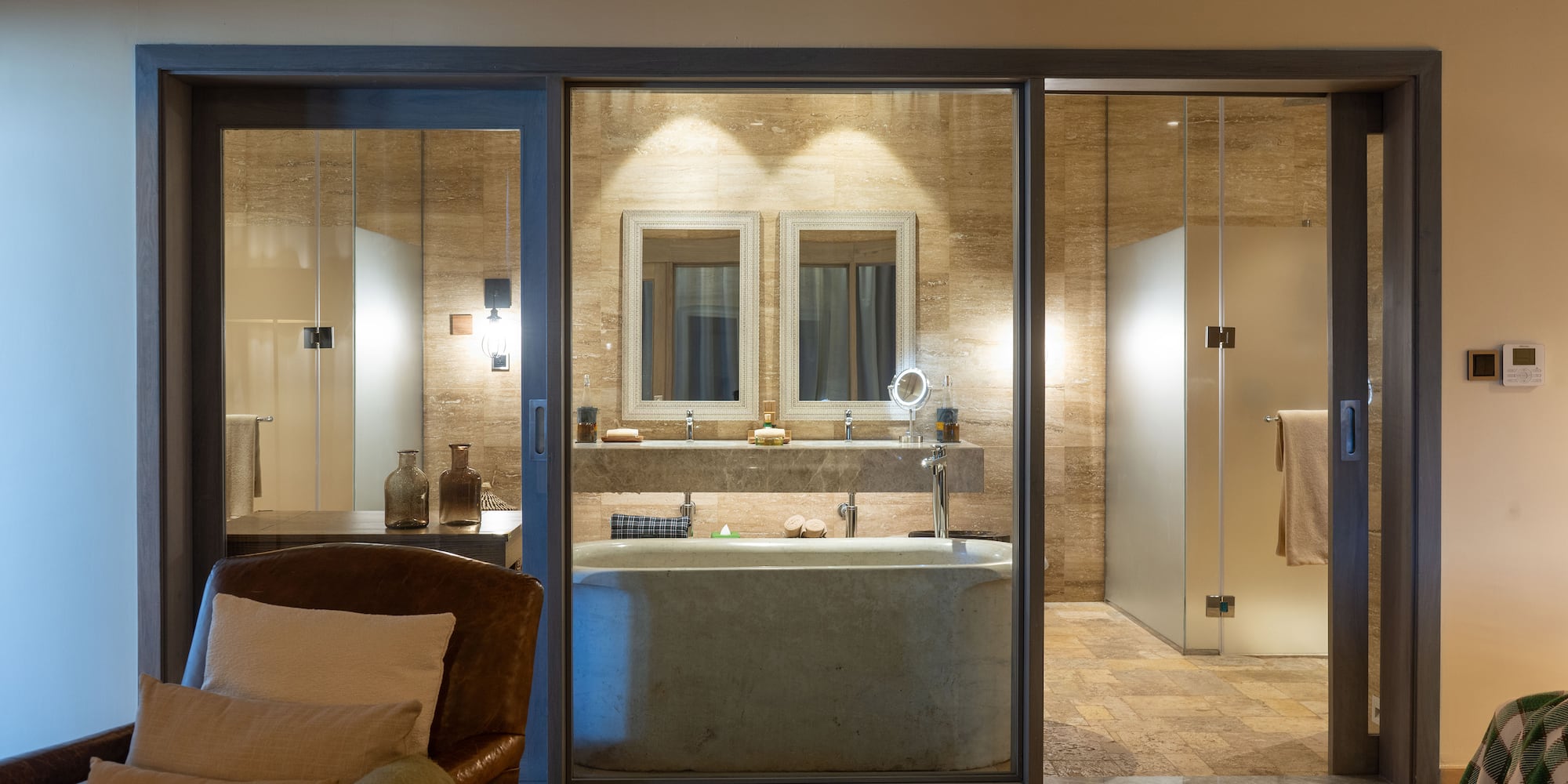 a bathroom with a tub and shower