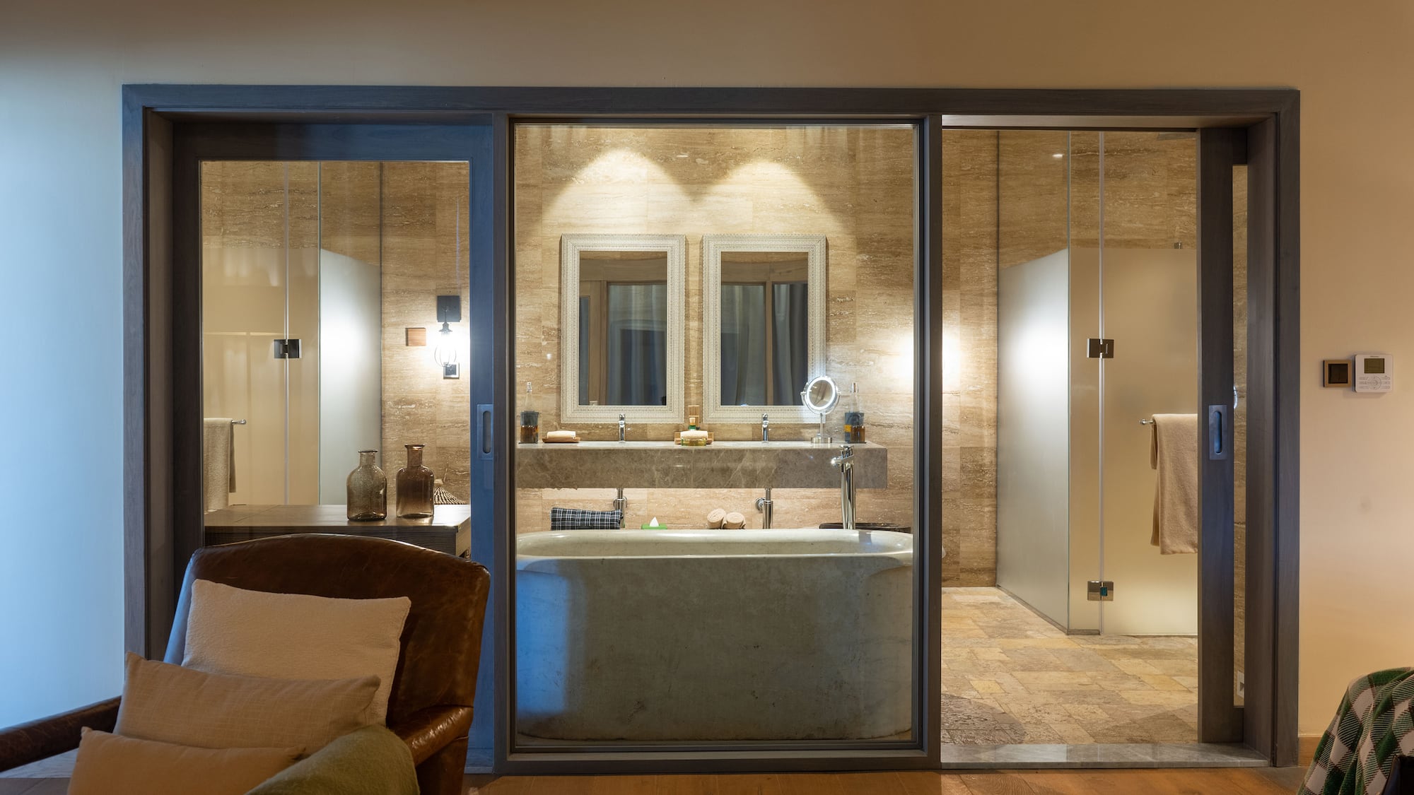 a bathroom with a tub and shower