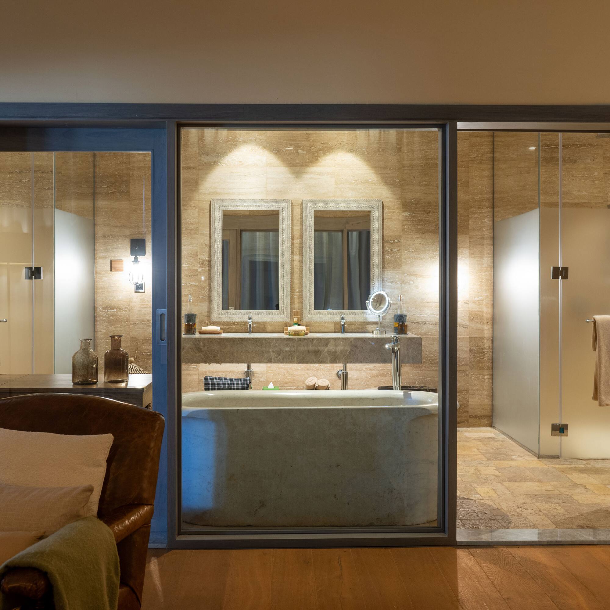 a bathroom with a tub and shower