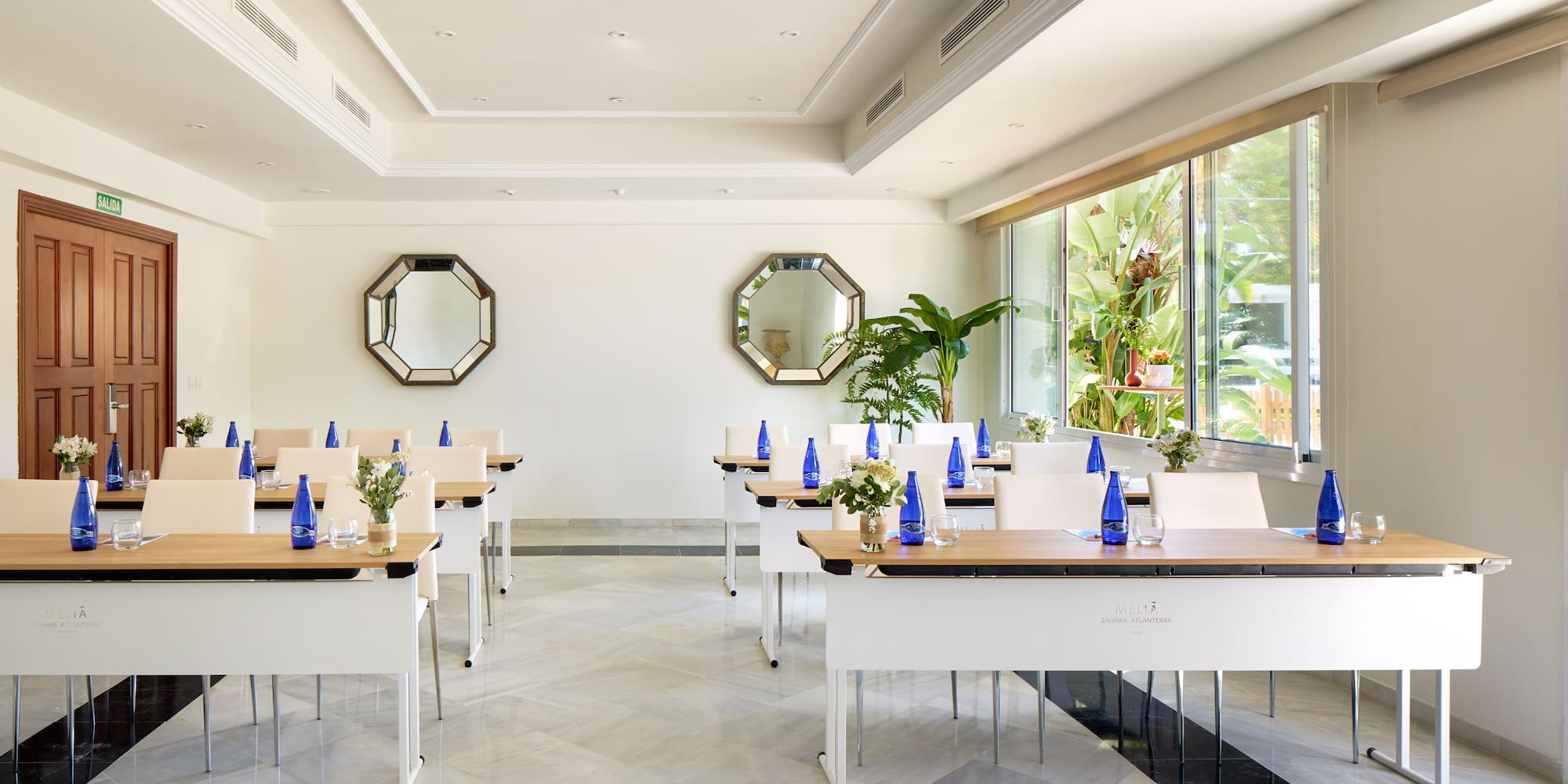 a room with tables and chairs