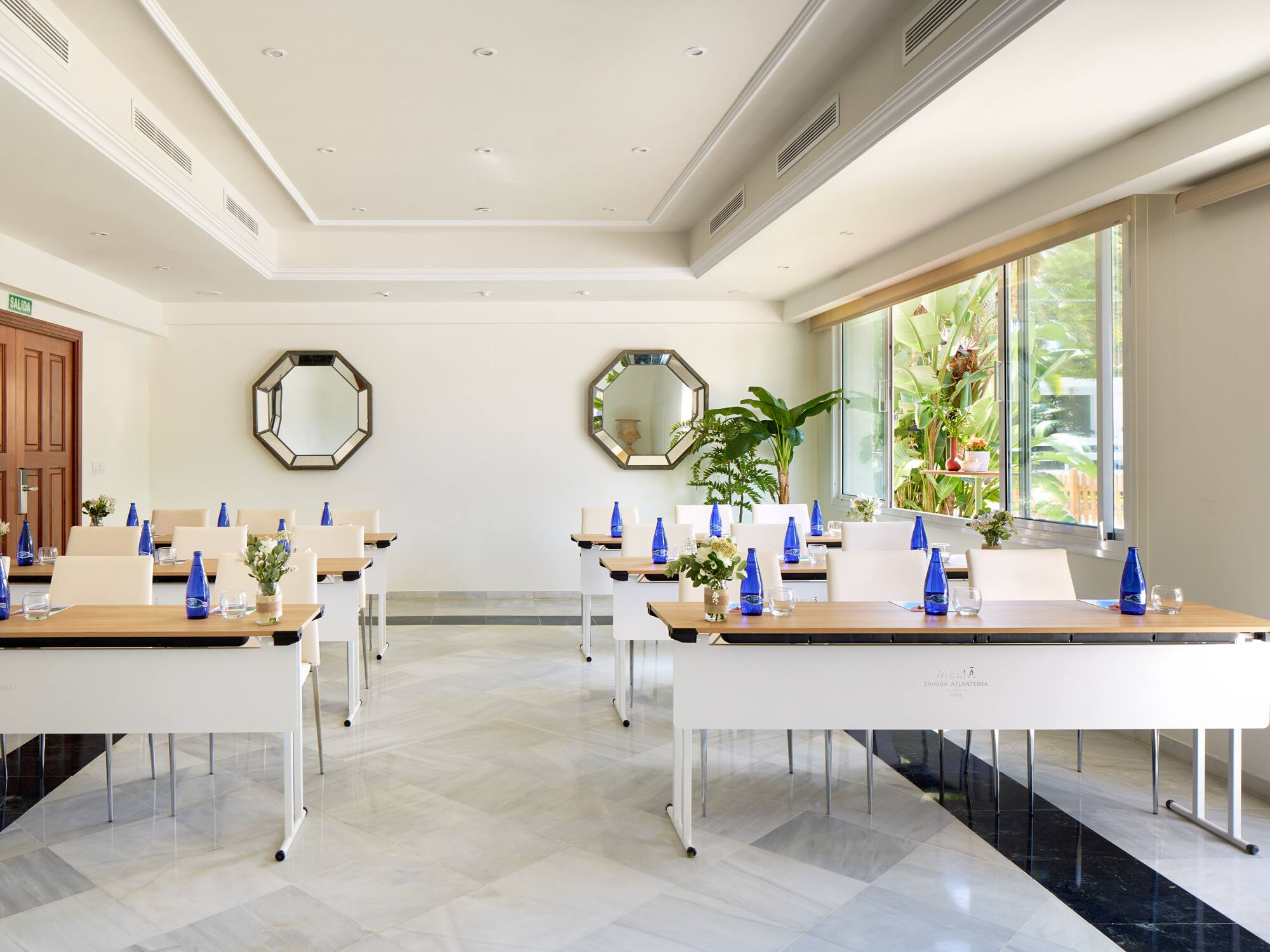 a room with tables and chairs