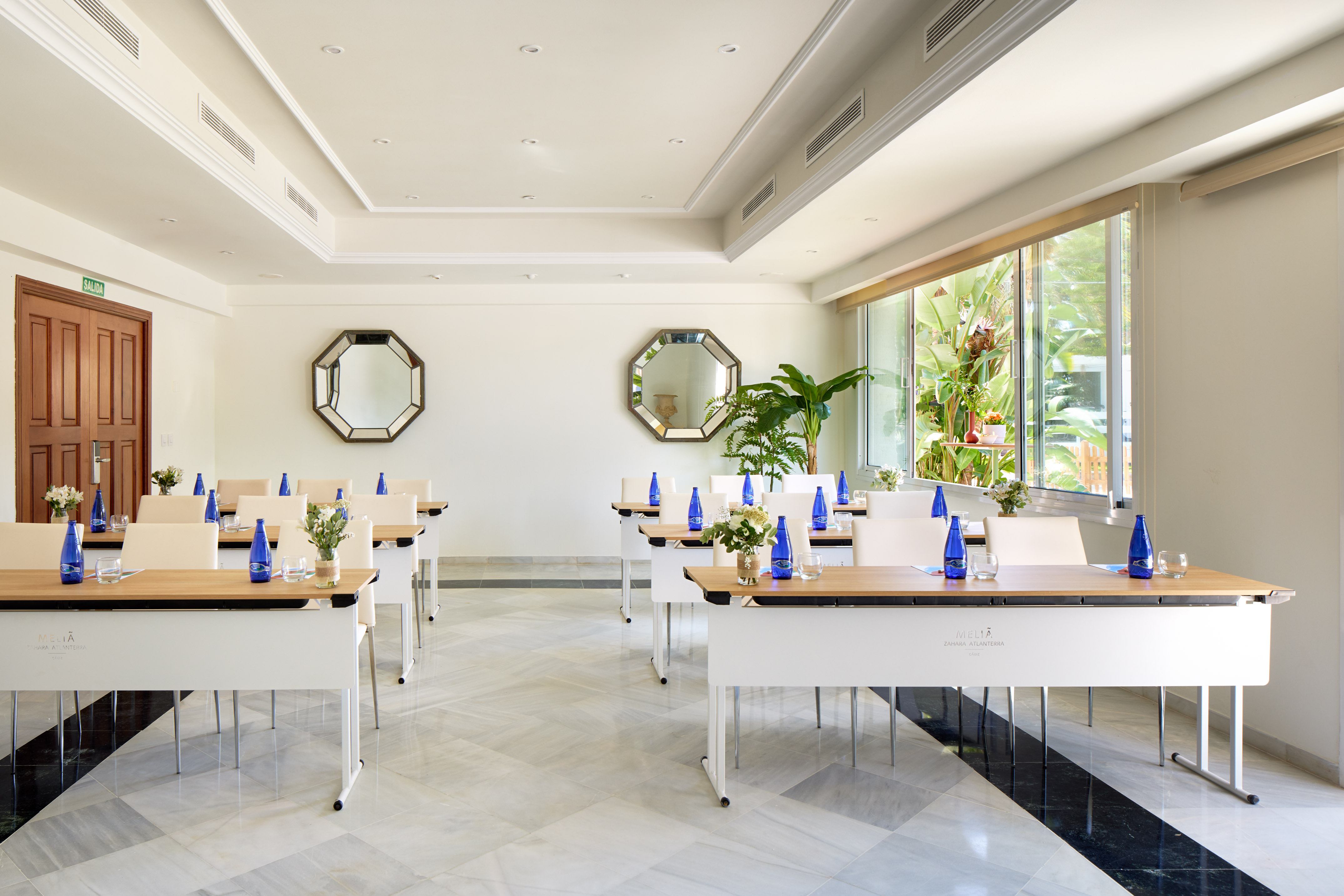 a room with tables and chairs