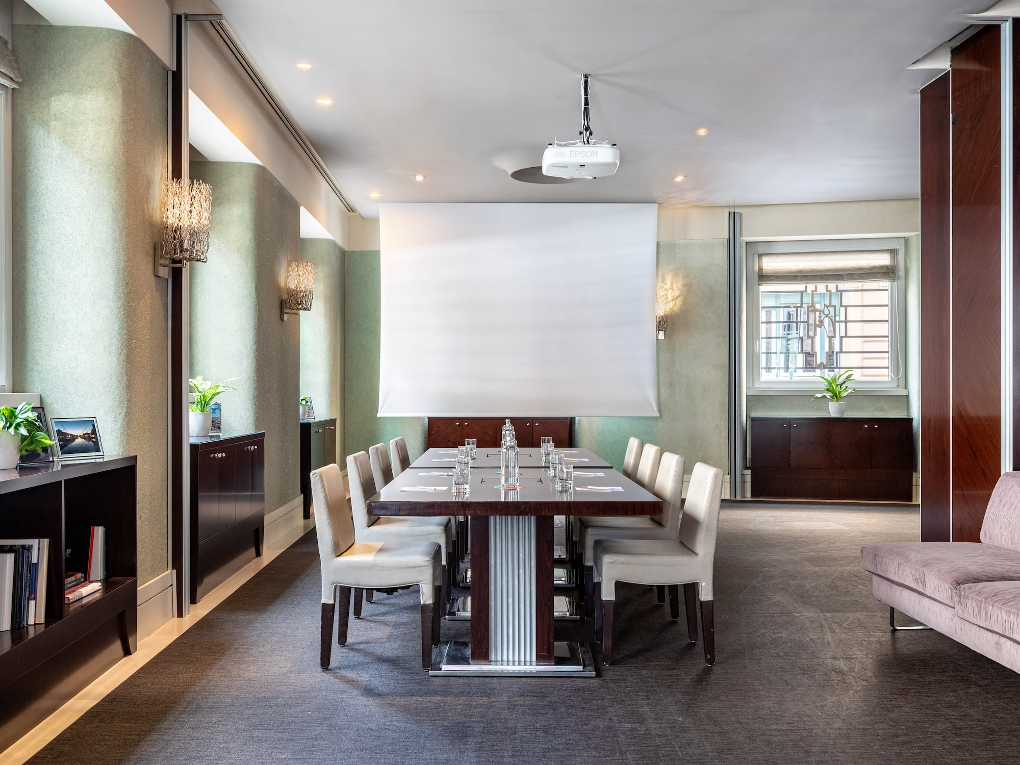 a room with a table and chairs