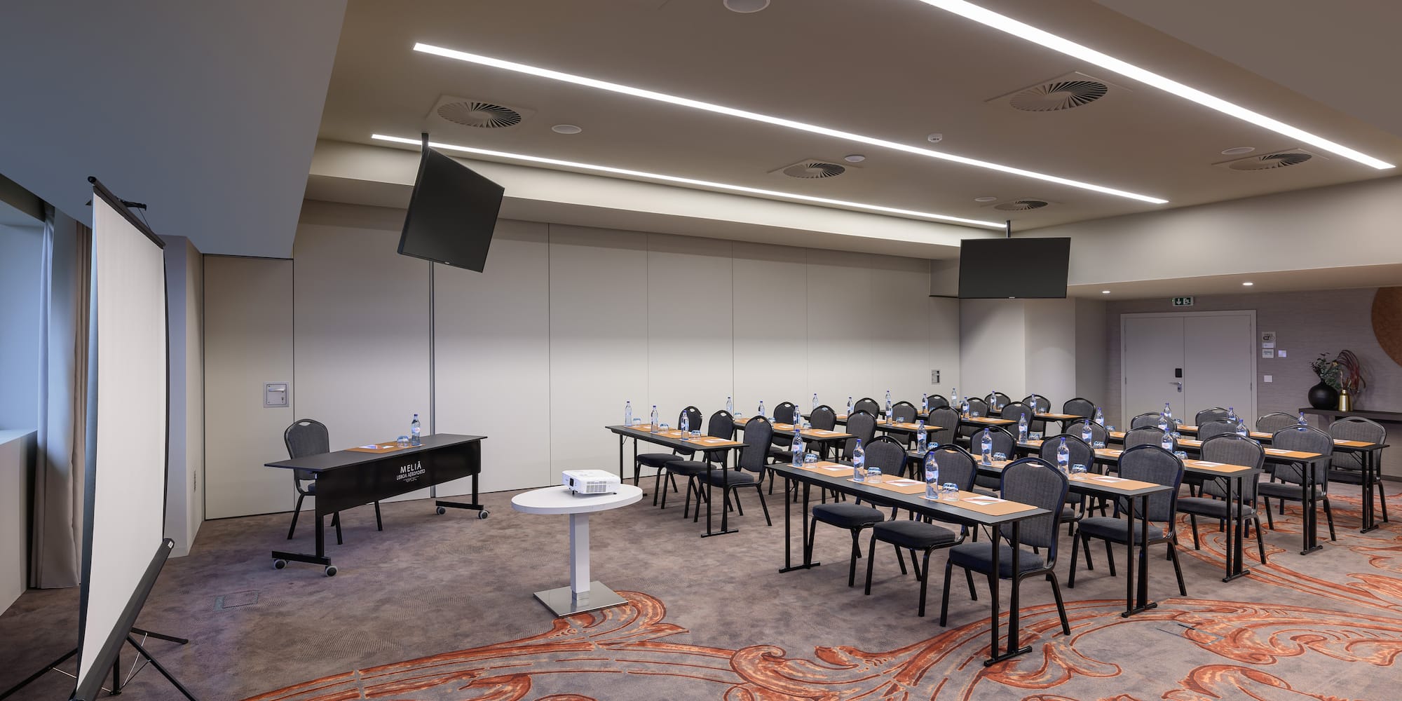 a room with tables and chairs