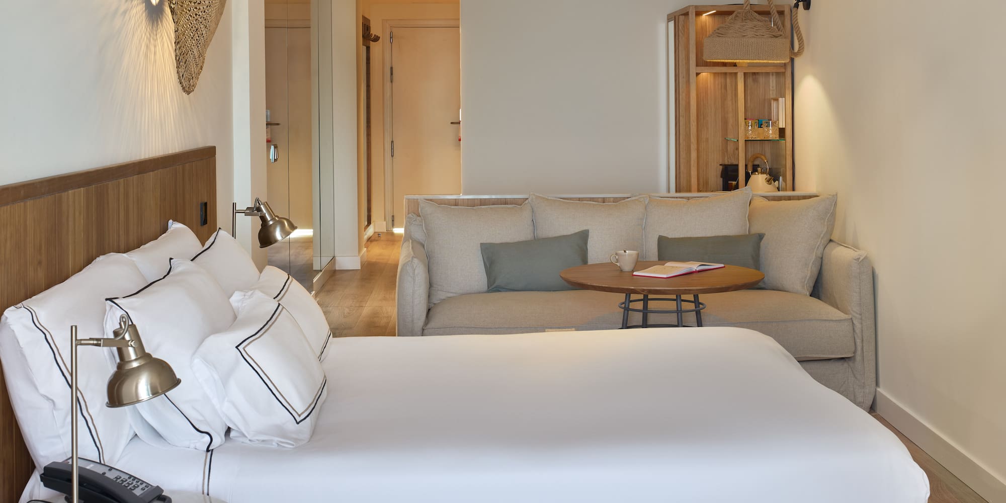 a room with a bed and couch