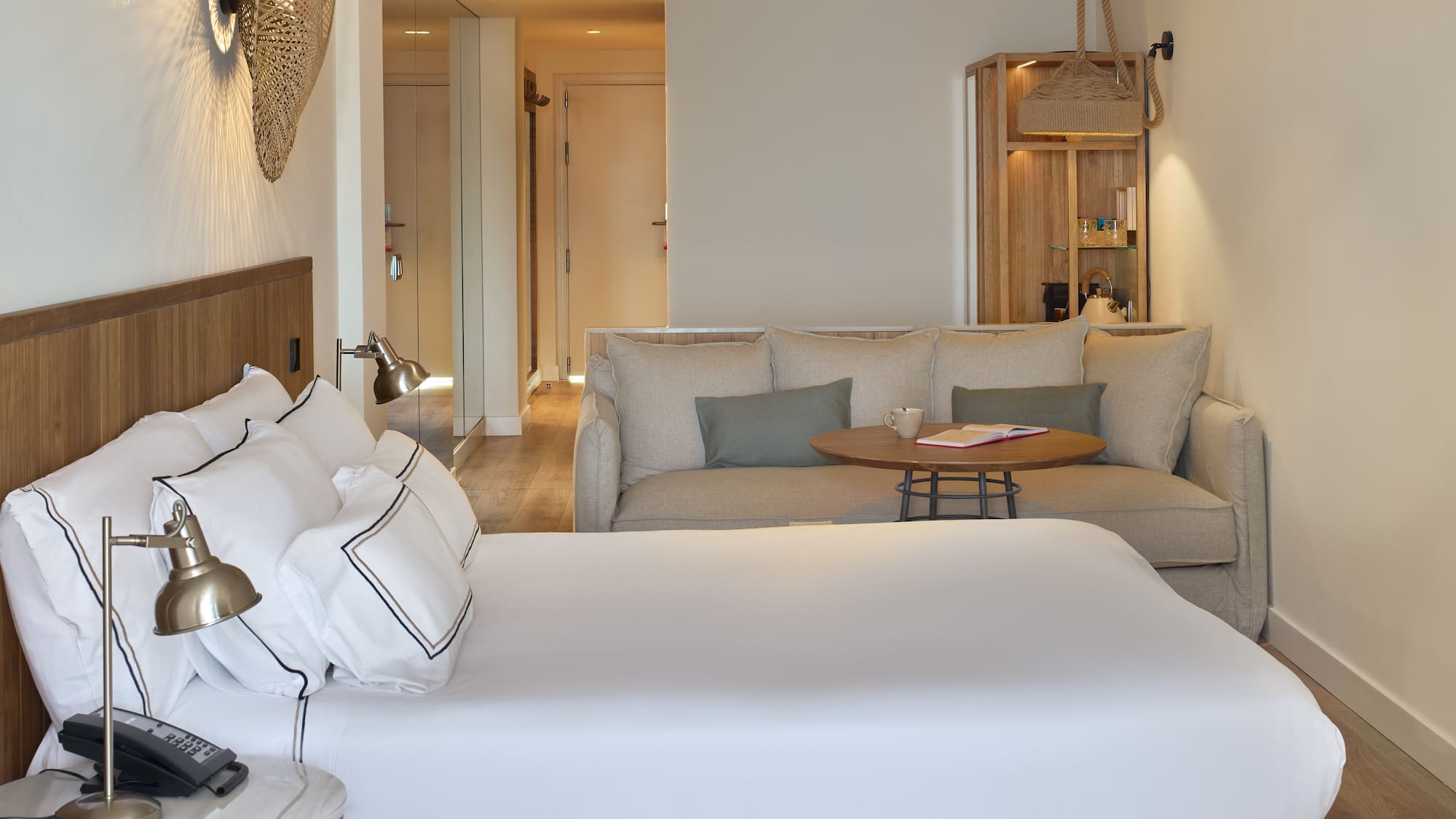 a room with a bed and couch