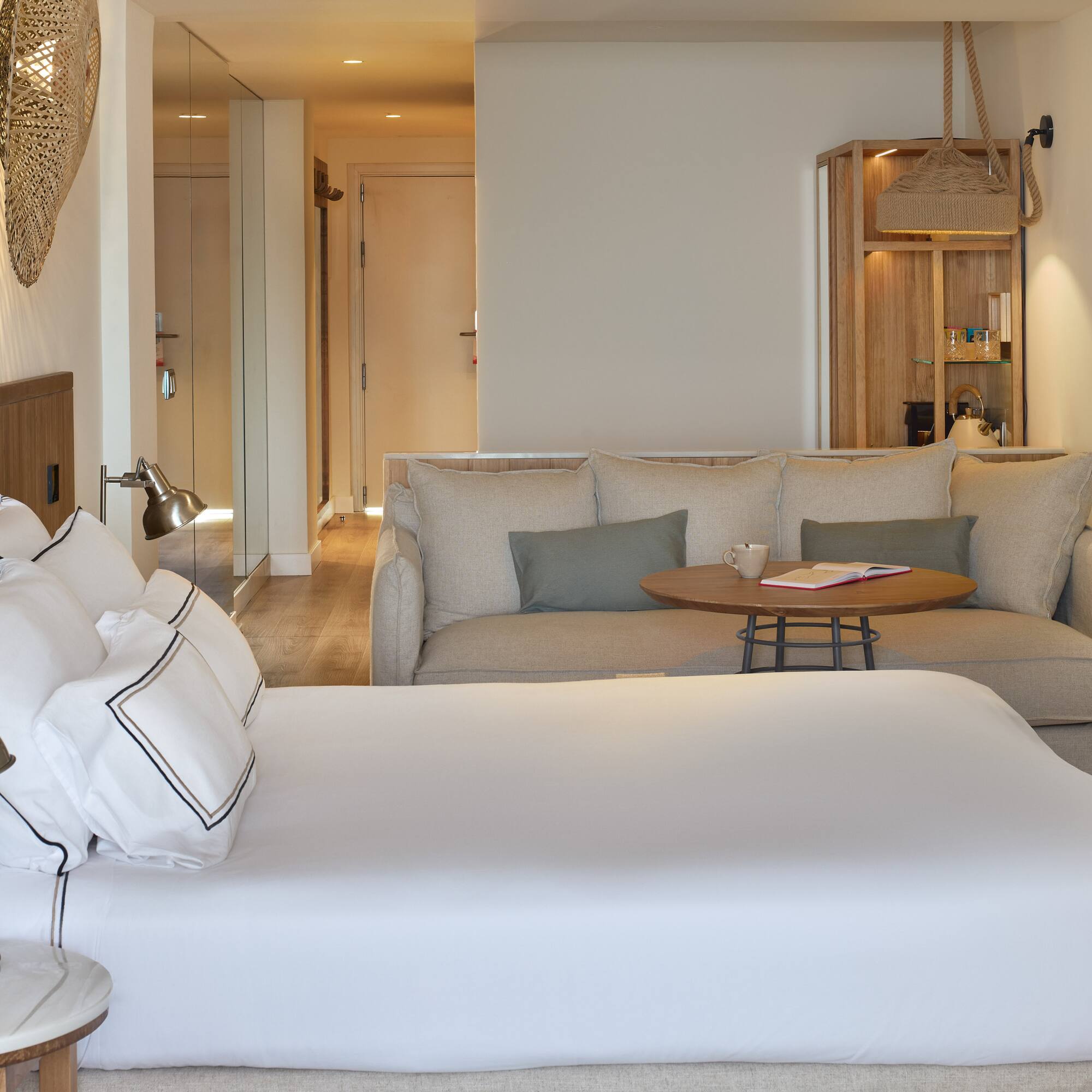 a room with a bed and couch