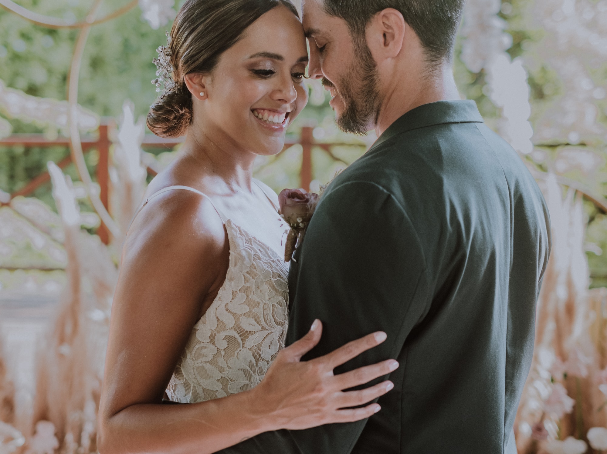 a man and woman hugging each other