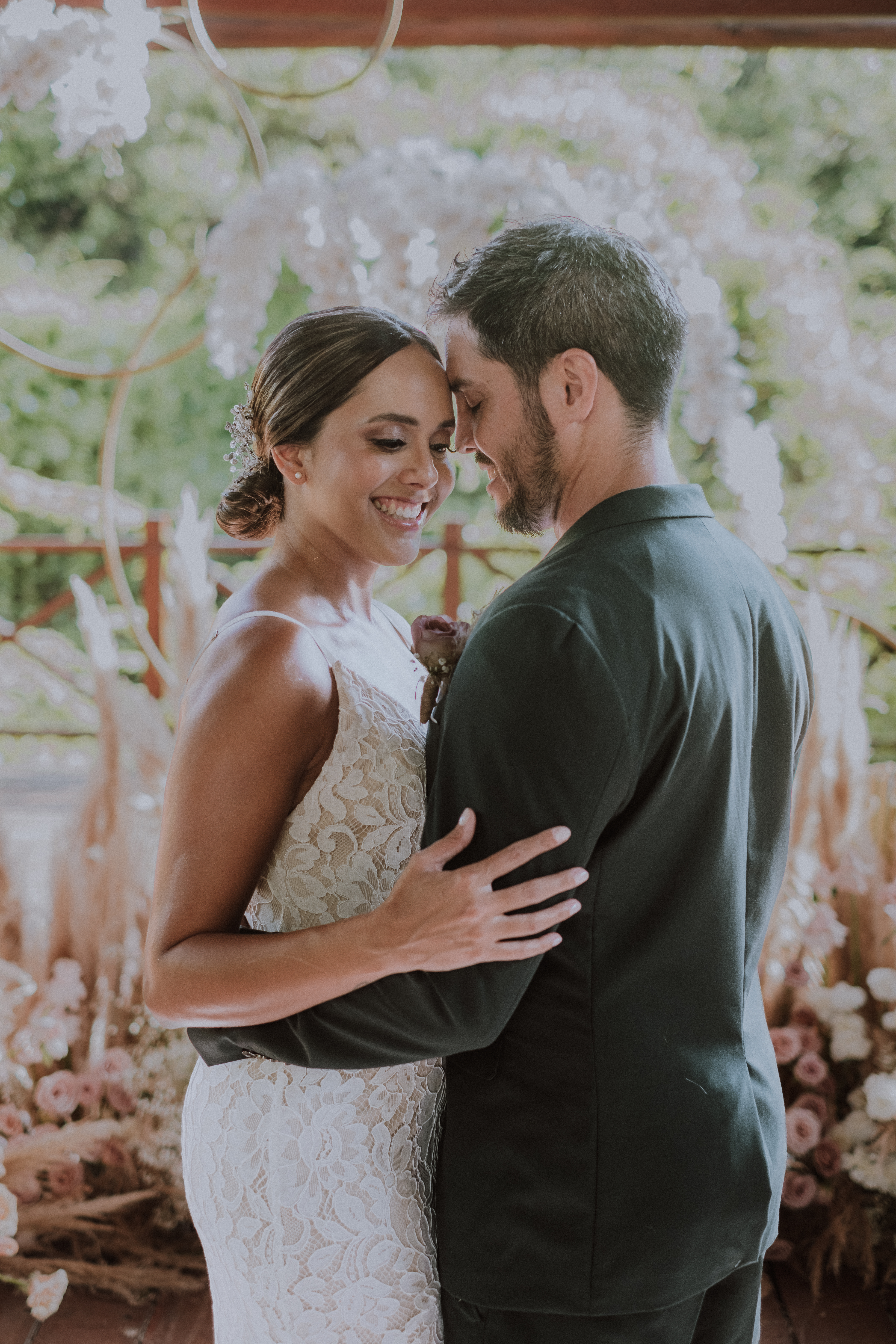 a man and woman hugging each other