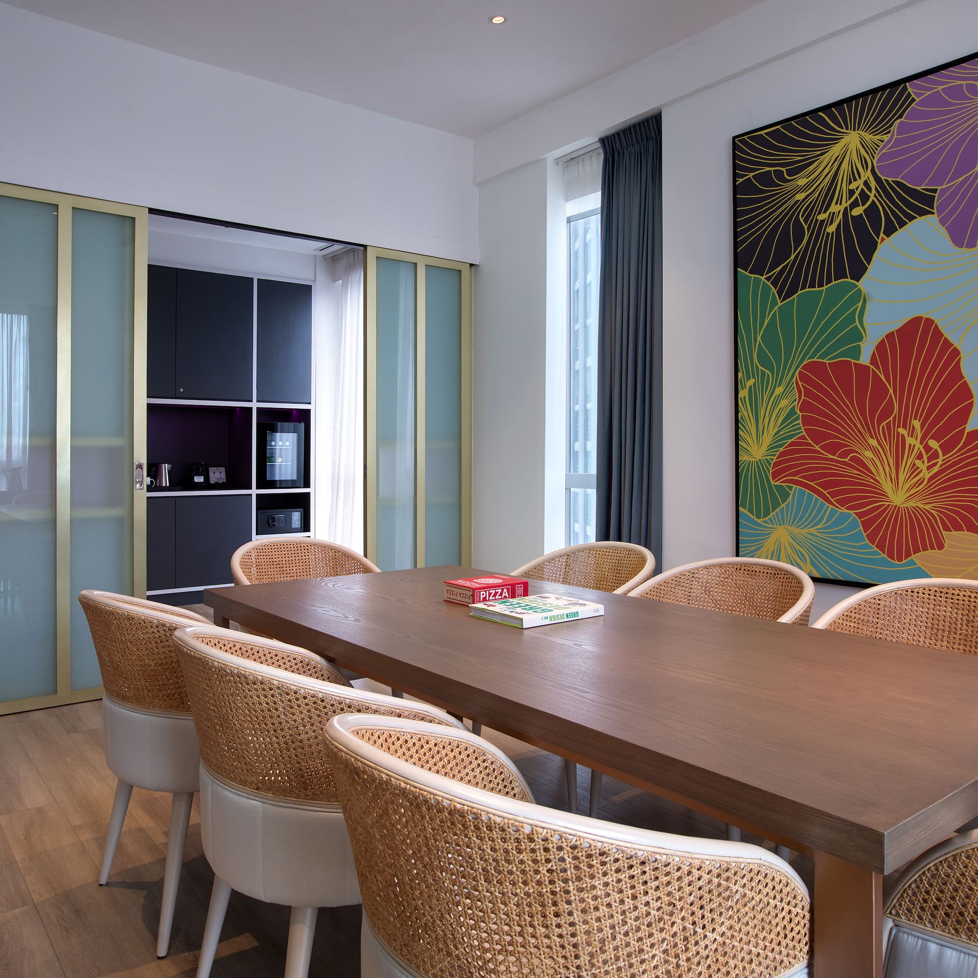 a room with a table and chairs