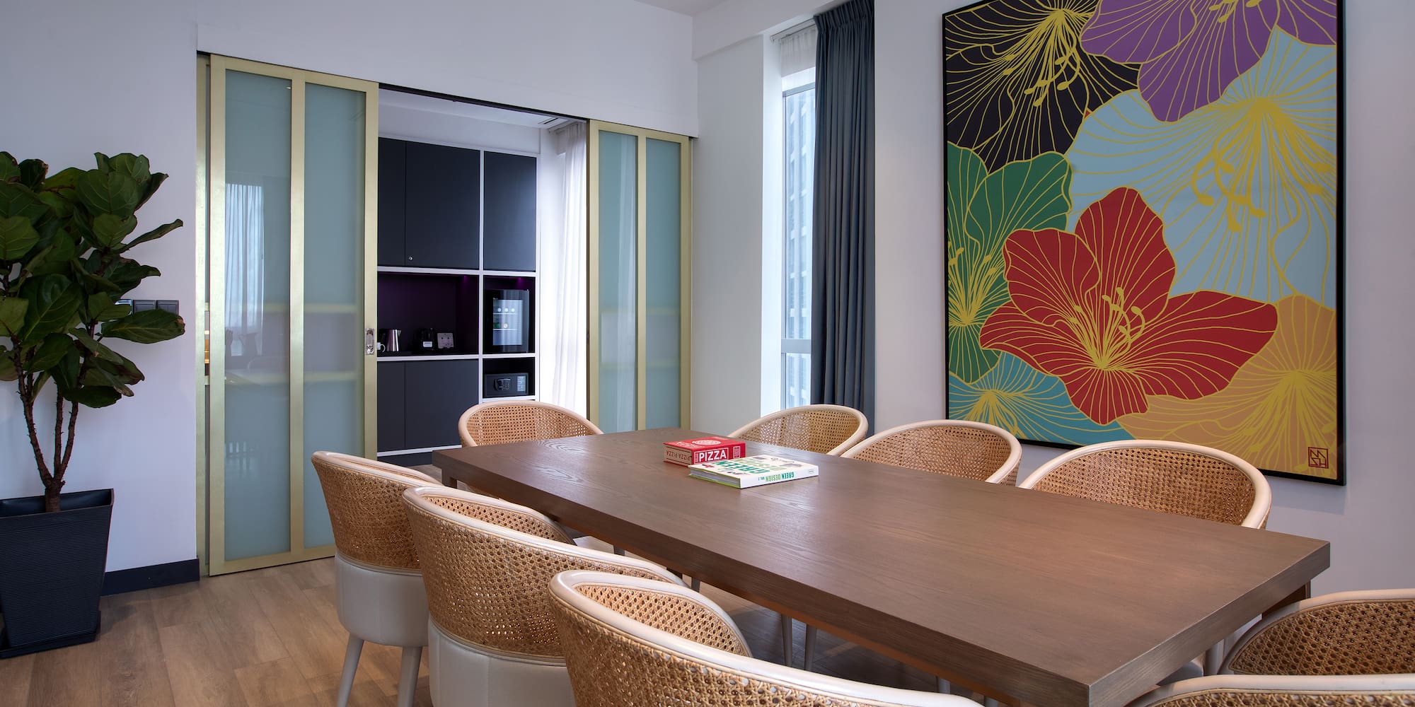 a room with a table and chairs