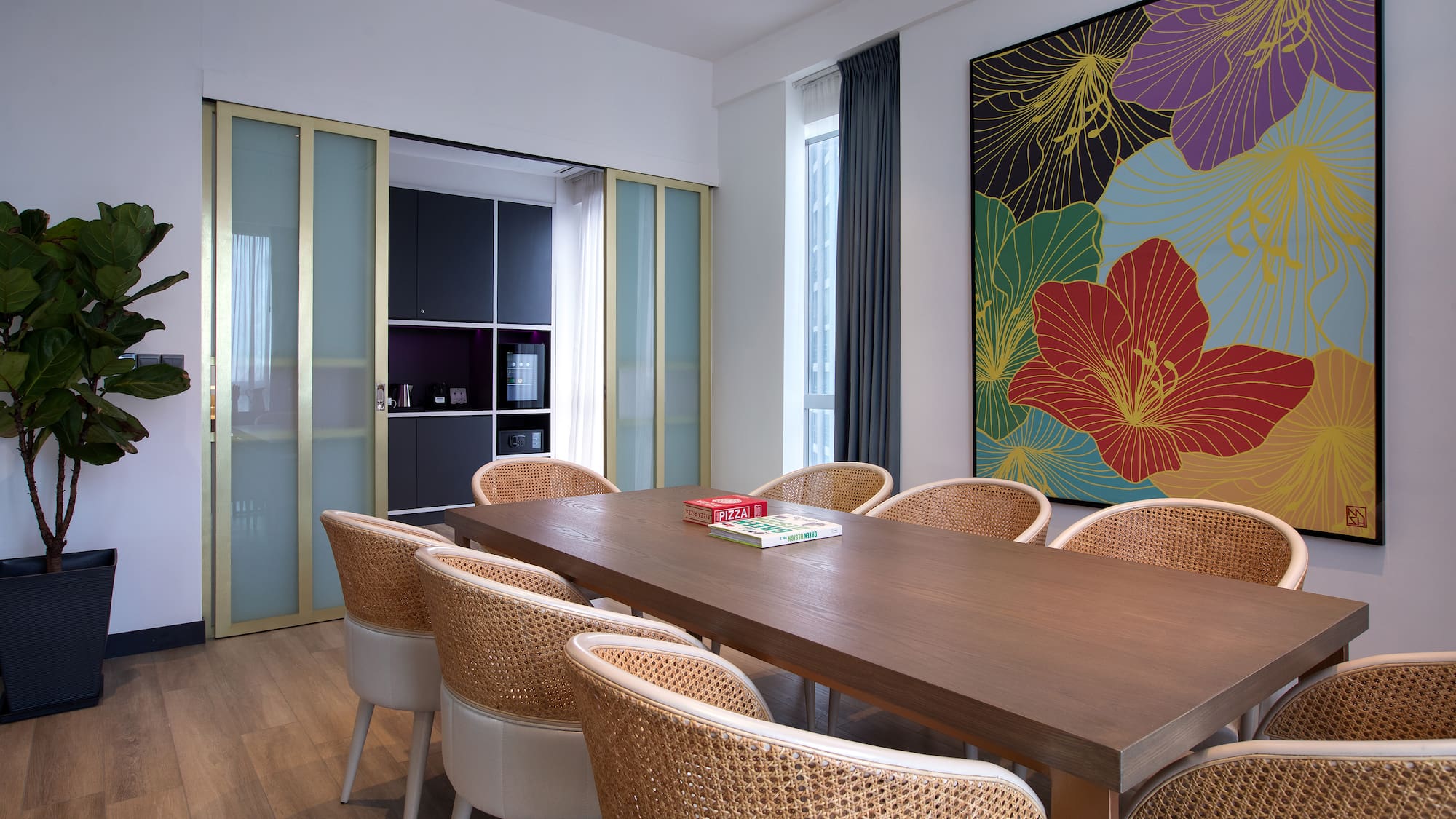 a room with a table and chairs